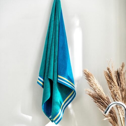 Indulge in the everyday luxury of the RoyaleStore Home Accents Bath Towel.